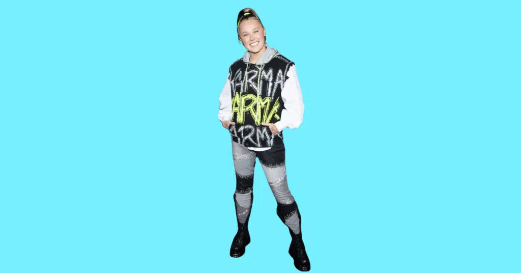 A full body picture of Jojo Siwa showing characteristics like height, age, and weight.