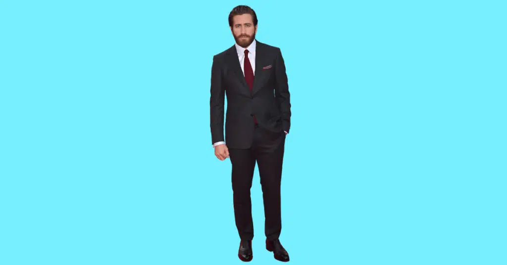 A full body picture of Jake Gyllenhaal showing characteristics like height, age, and weight.