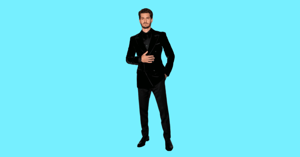 A full body picture of Andrew Garfield showing characteristics like height, age, and weight.