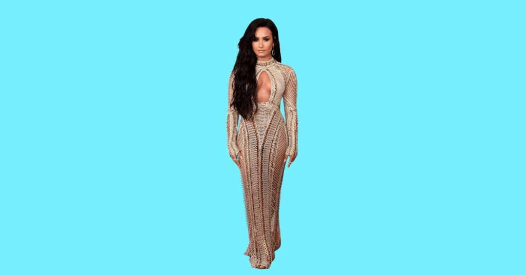 A full body picture of Demi Lovato showing characteristics like height, age, and weight.