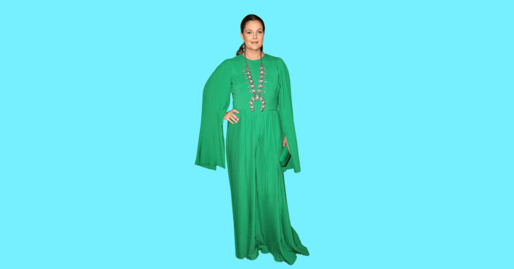 A full body picture of Drew Barrymore showing characteristics like height, age, and weight.